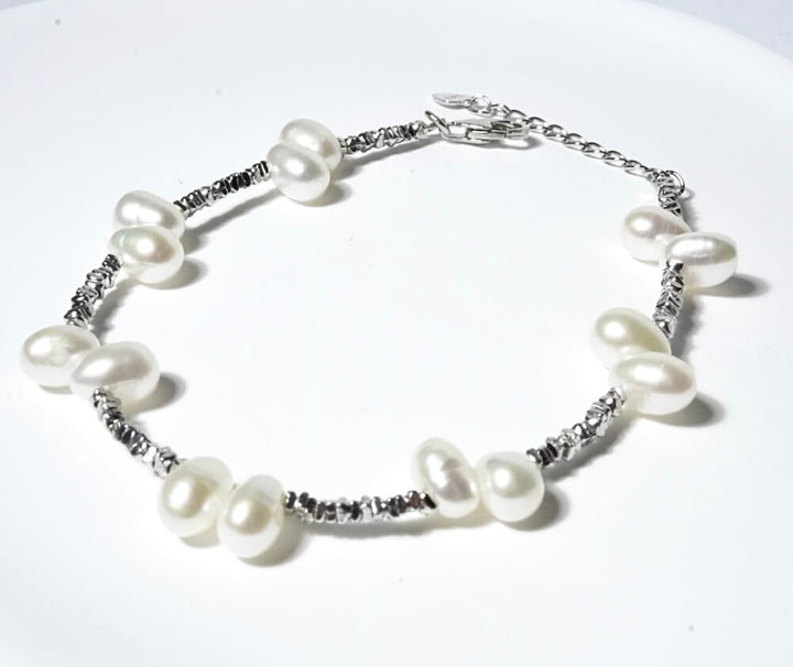 google-ads-Freshwater rice-shape Pearl Bracelet Good Quality