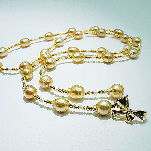 googleads_goldensouthseacirclepearlnecklace_graceselected