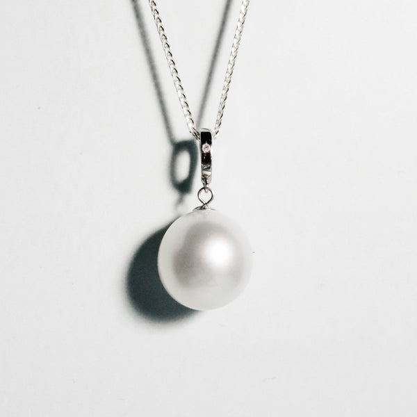 White South Sea pearl with excellent lustre and clean surface set in sleek minimalist white gold design