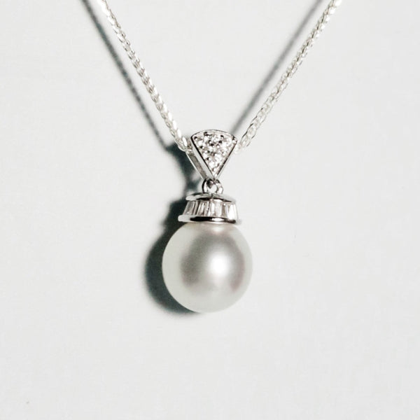 Petite South Sea pearl with luminous lustre and clean surface in silver crown setting with zirconia