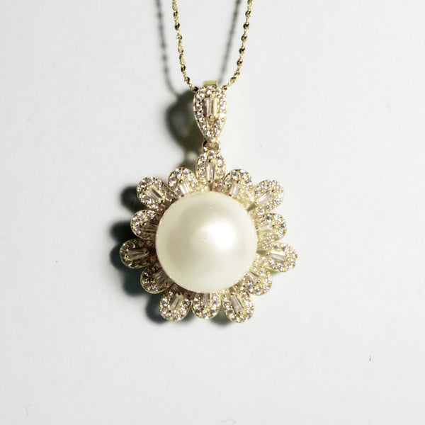 Rosette Charm pendant with 13.5mm creamy white South Sea pearl and gold floral setting from GRACE SELECTED